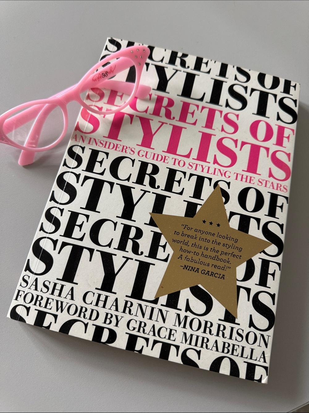Secrets of Stylists Book - White & Black Cover with Pink Accents plus sunglasses